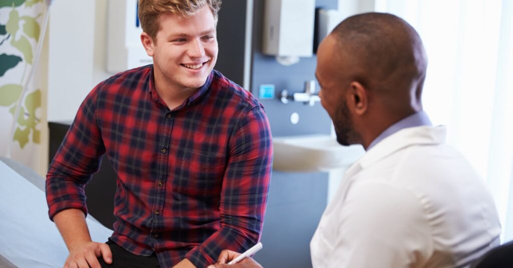 Man talks to his doctor.
