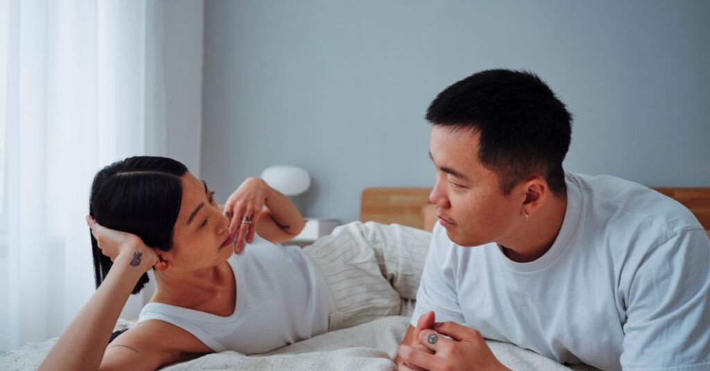 Couple having a heartfelt conversation about intimacy.