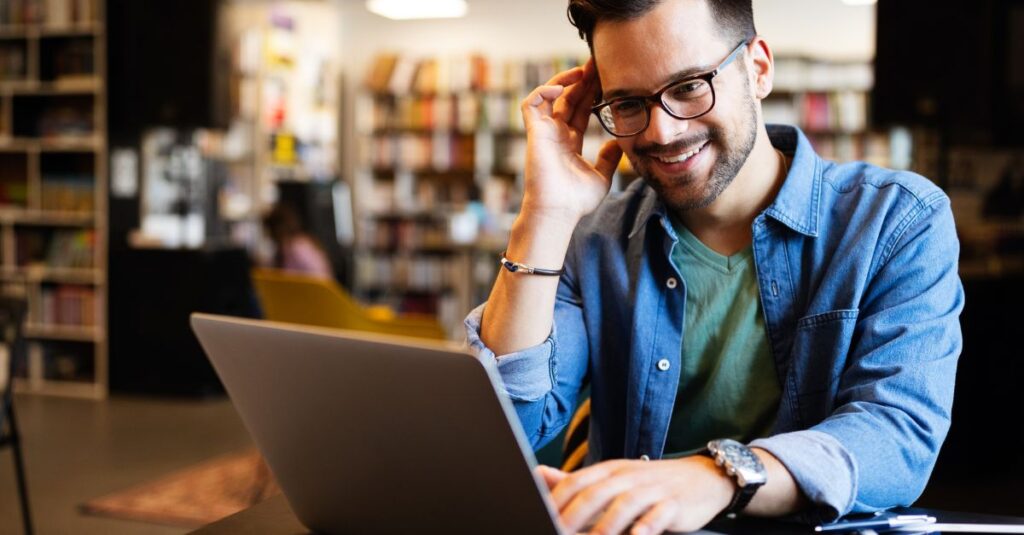 Man experiencing a virtual therapy session with joy.