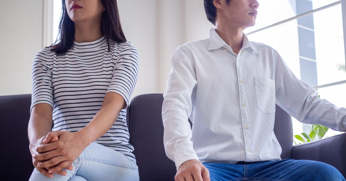 Couple experiencing emotional distance and fading intimacy in long-term relationship