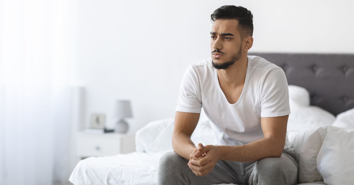 Man experiencing erectile dysfunction and performance anxiety seeking solutions without shame