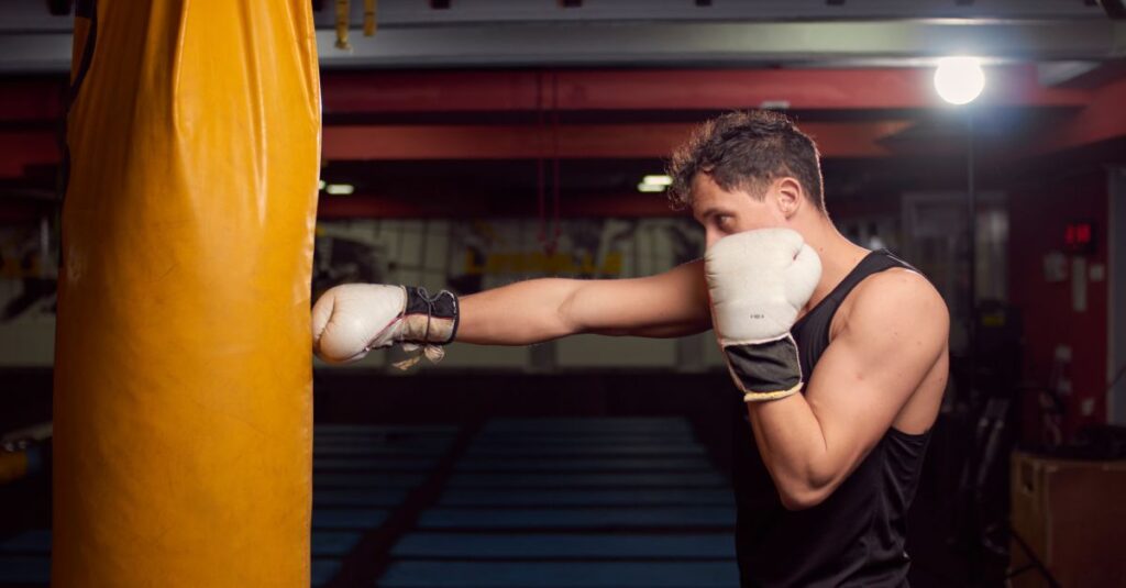 Man releasing intense anger and frustration through physical outlet showing emotional overwhelm